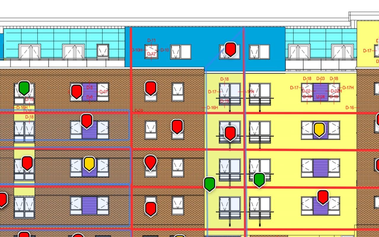 Facade 365 showing a building elevation with defect markers pinned to it